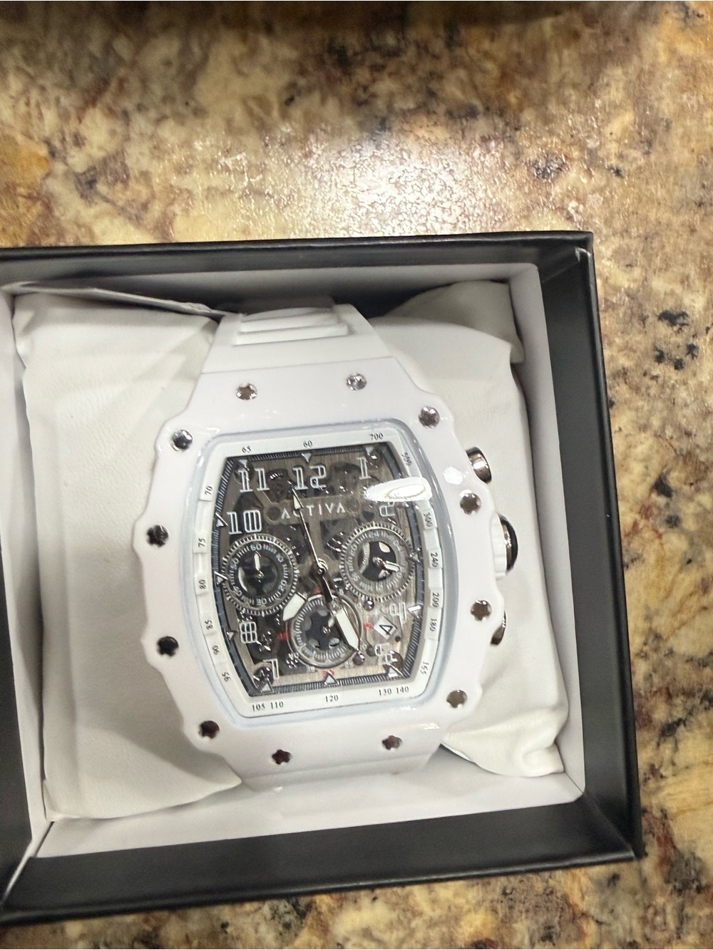White invicta skeleton watch